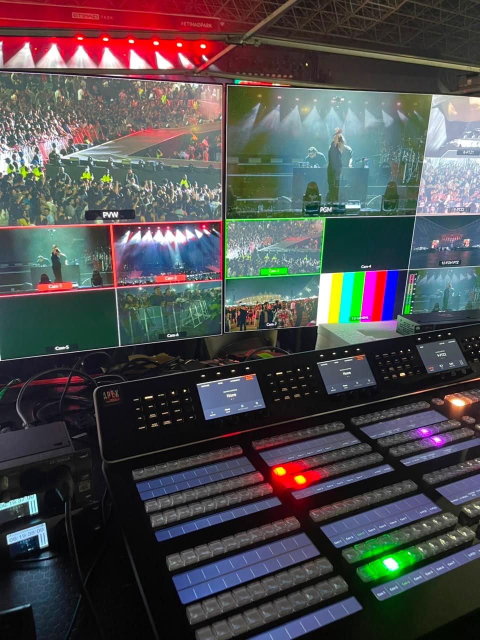 Vision mixing desk monitoring a live arena concert